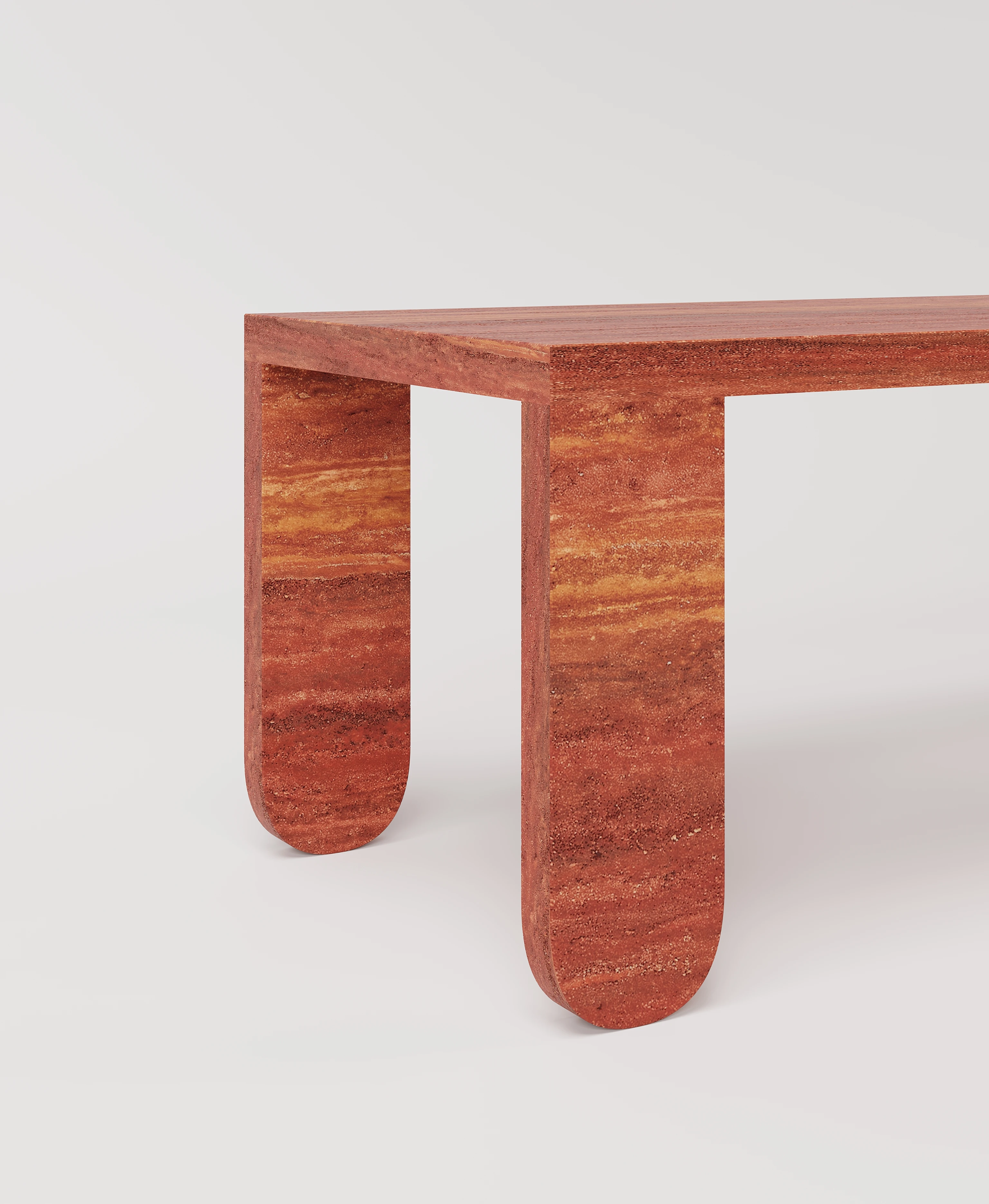 Большой стол с закругленными ножками из красного травертина