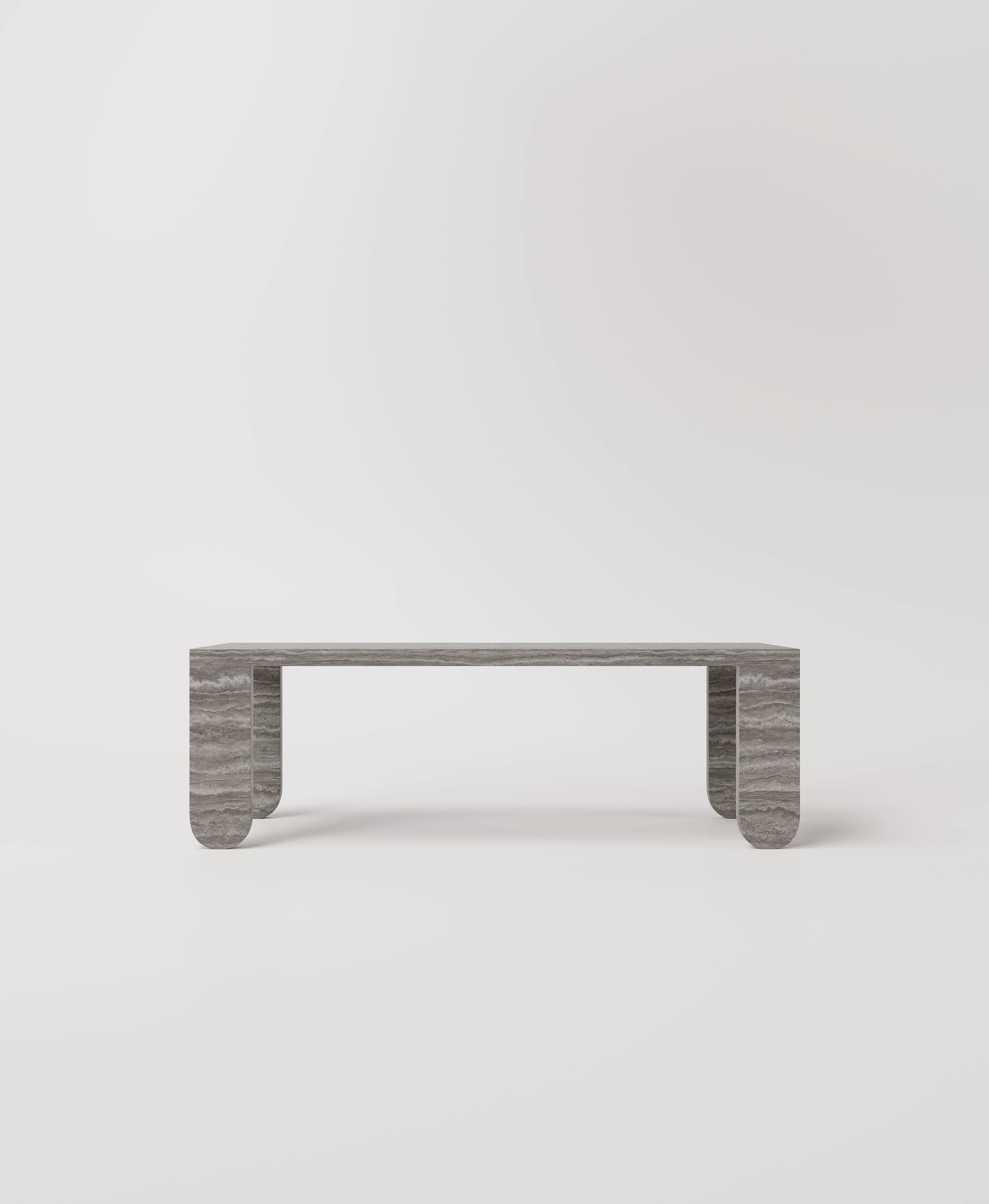 Большой стол с закругленными ножками из серого травертина