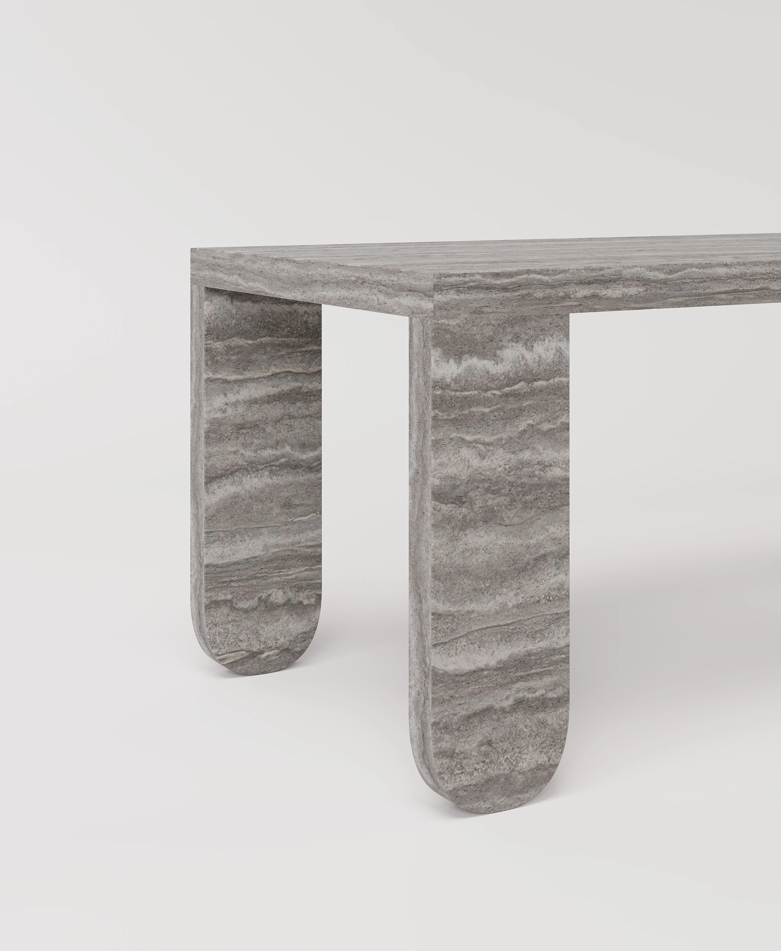 Большой стол с закругленными ножками из серого травертина
